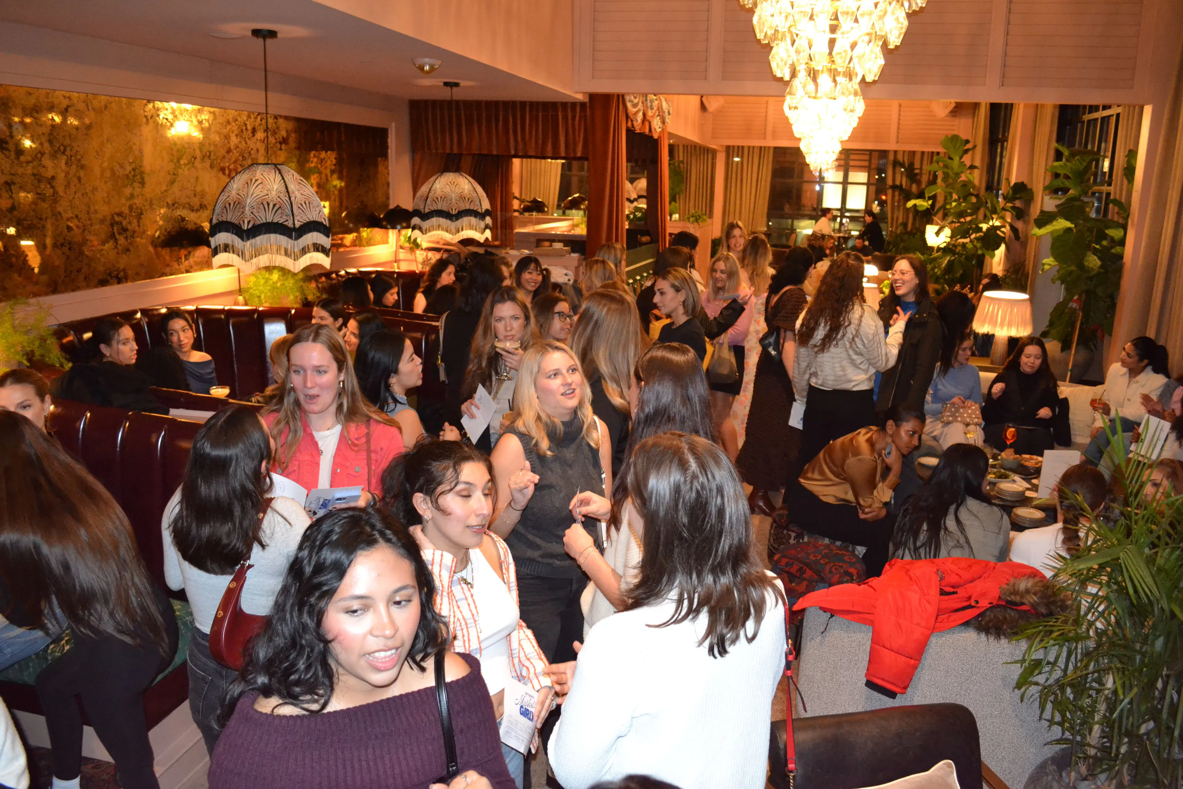 Women gathered in a lounge during a Sky Society event