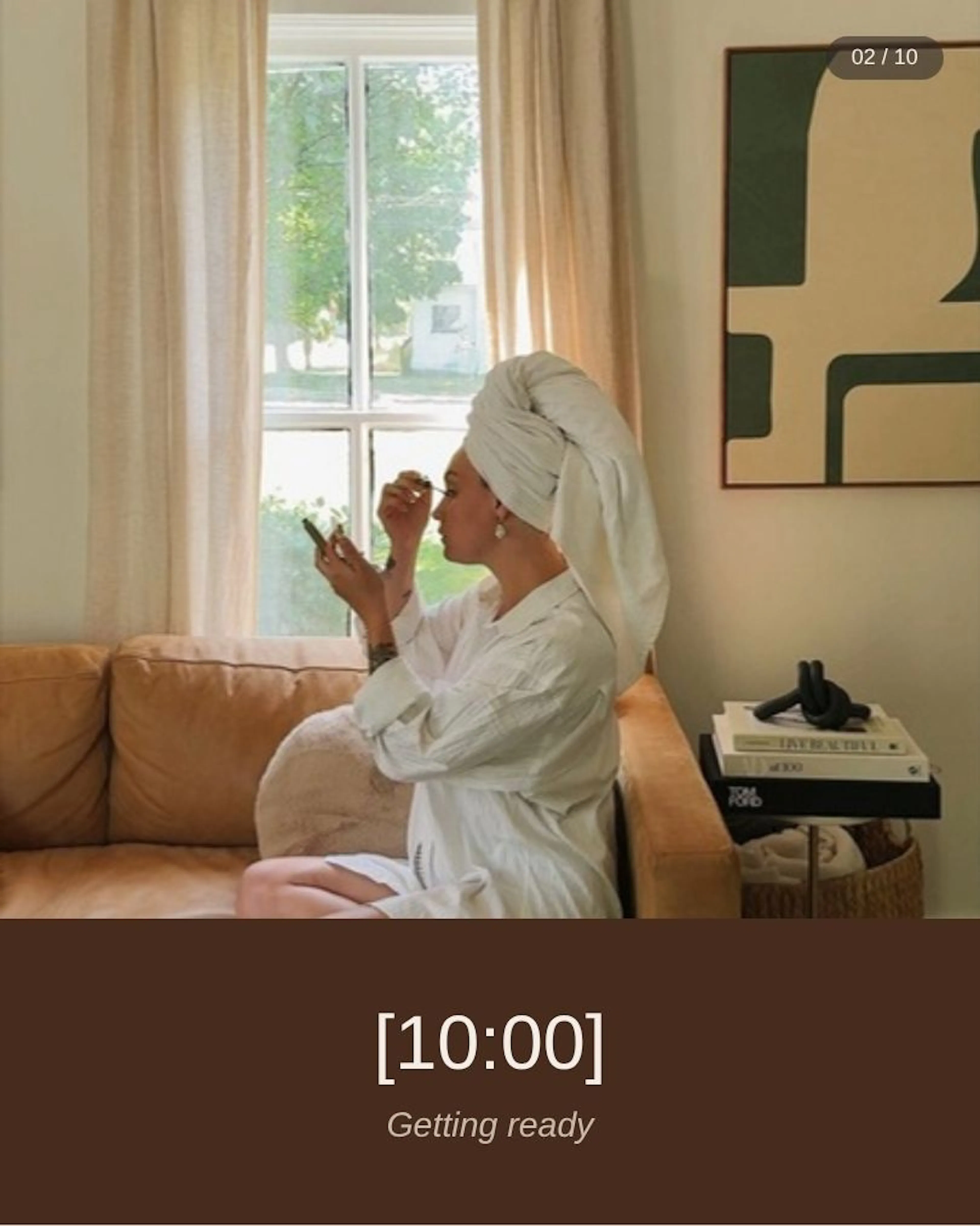 Slide 2 of 10 of a wedding-day carousel: a bride in a towel turban doing her makeup by a window, above the time "[10:00]" and "Getting ready".